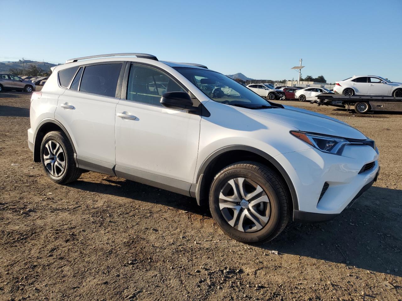 2018 Toyota RAV 4 VIN JTMZFREV4JJ210868 Copart auction photo, all over damage thumbnail 4