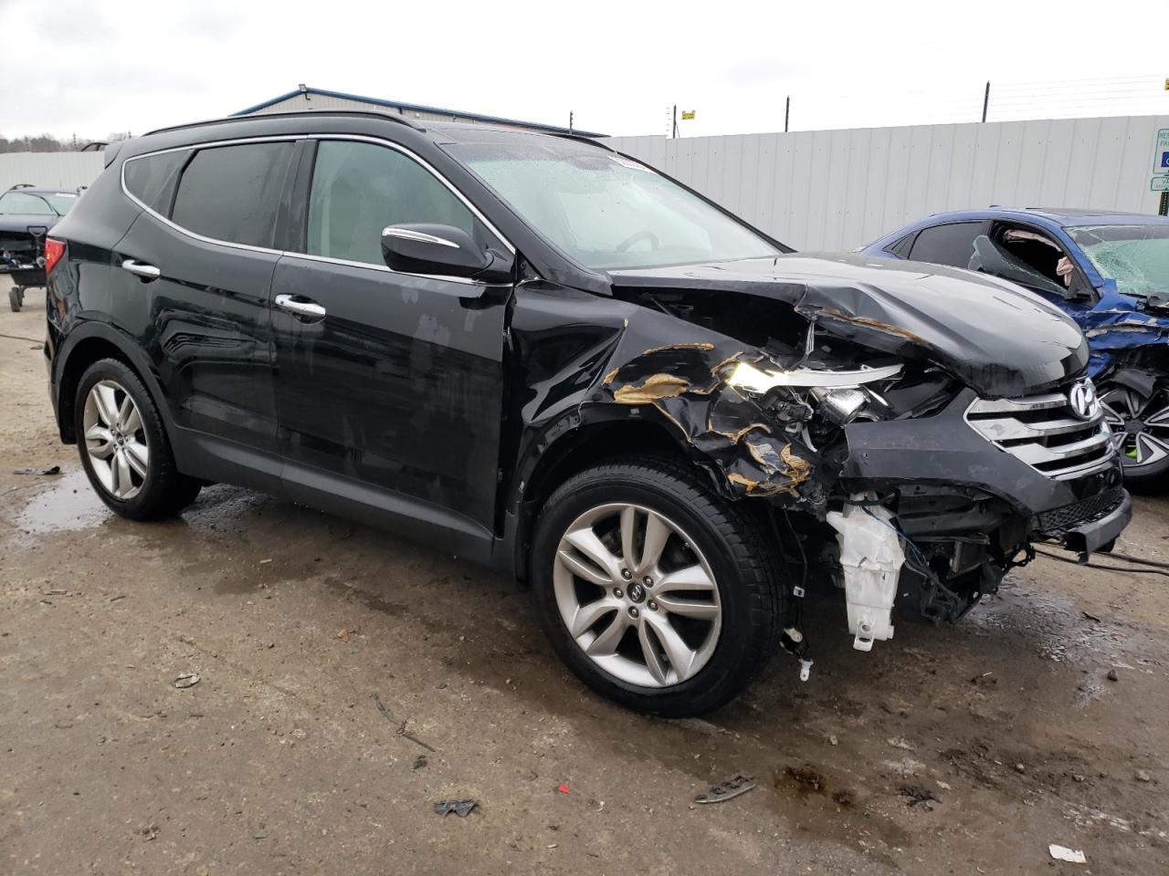 2015 Hyundai Santa Fe VIN 5XYZWDLA9FG247795 Copart auction photo, front end damage thumbnail 4