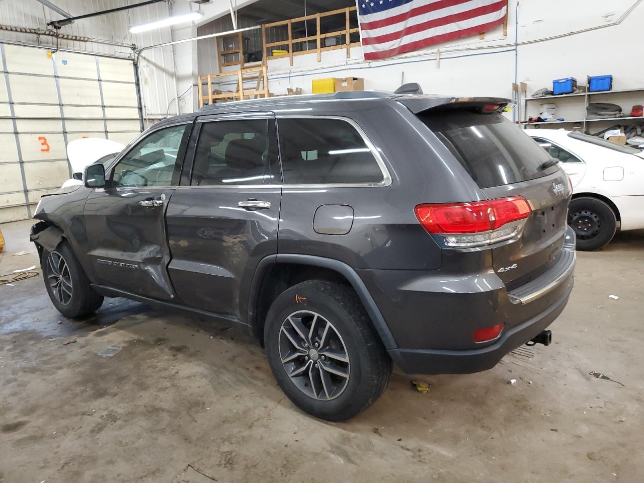 2018 Jeep Grand Cherokee VIN 1C4RJFBGXJC245468 Copart auction photo, side / front end damage thumbnail 2