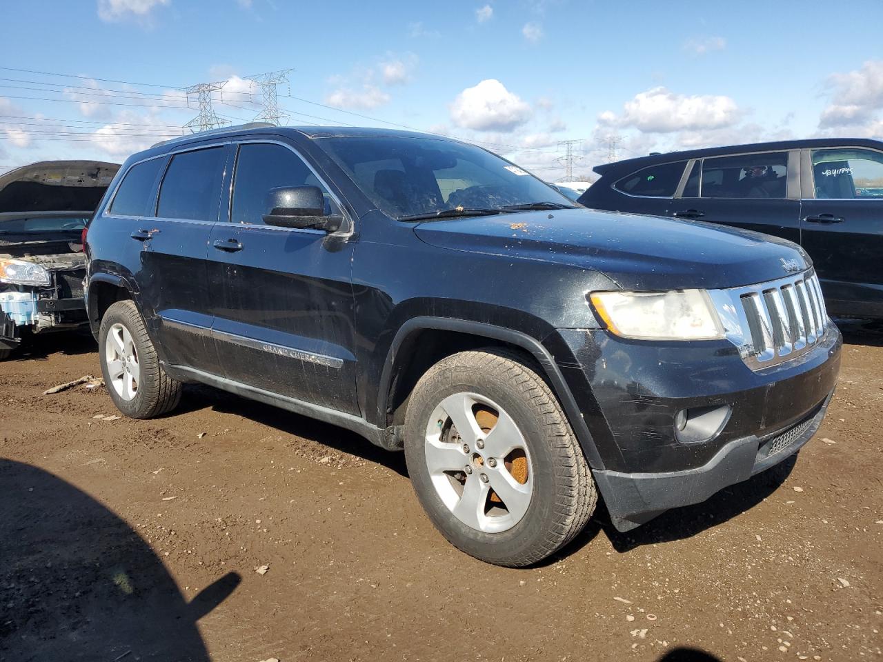 2011 Jeep Grand Cherokee VIN 1J4RR4GG8BC517680 Copart auction photo, side / minor dent/scratches damage thumbnail 4