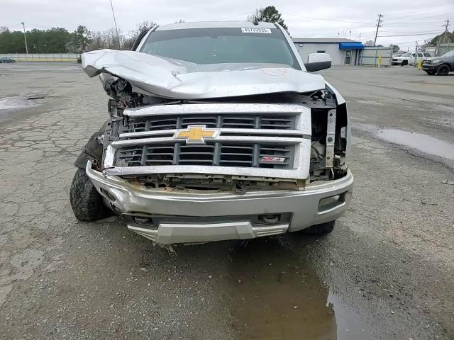 2015 Chevrolet Silverado VIN 1GCVKREC0FZ405643 Copart auction photo, front end / all over damage thumbnail 11