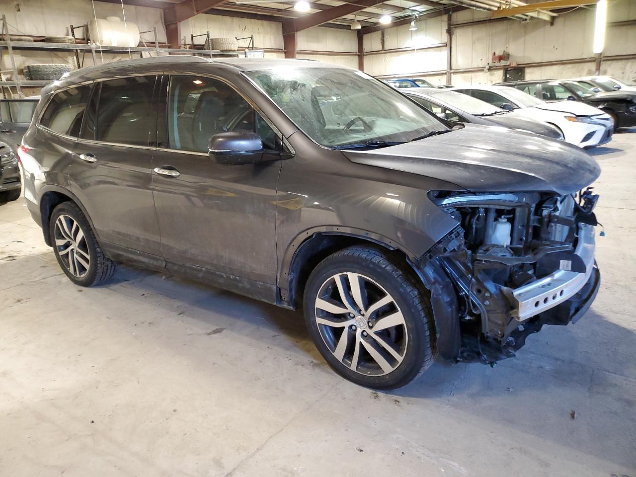 2017 Honda Pilot VIN 5FNYF6H05HB007418 Copart auction photo, front end / minor dent/scratches damage thumbnail 4