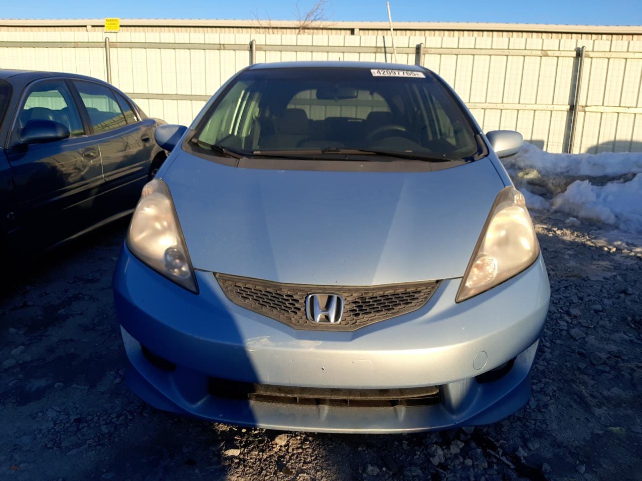 2009 Honda Fit VIN JHMGE88489S028828 Copart auction photo, rear end damage thumbnail 5