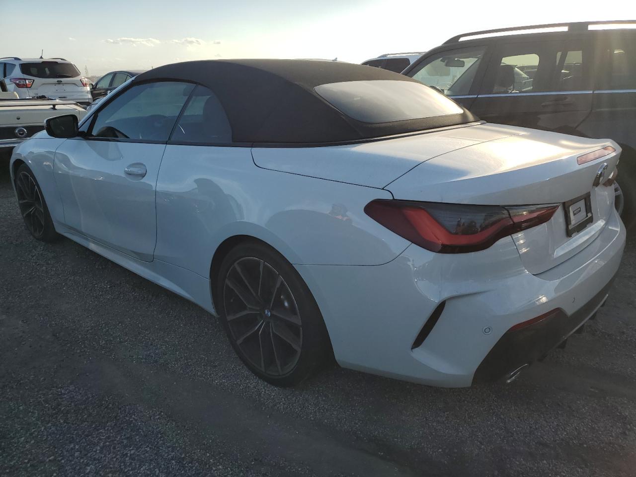 2022 BMW 4er VIN WBA23AT02NCJ38076 Copart auction photo, water/flood damage thumbnail 2