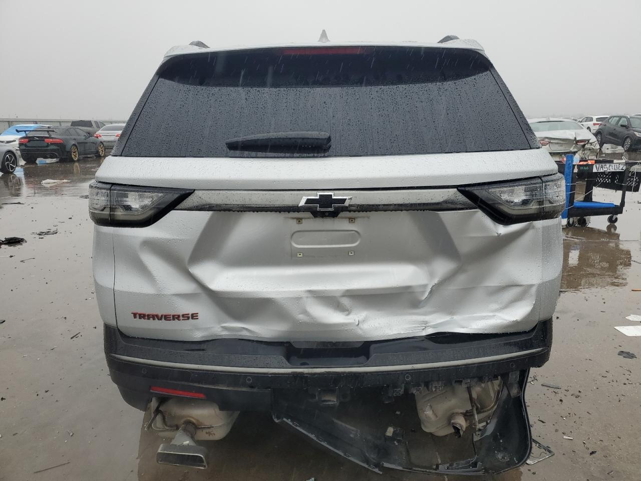 2018 Chevrolet Traverse VIN 1GNERKKW2JJ214774 Copart auction photo, rear end / hail damage thumbnail 6