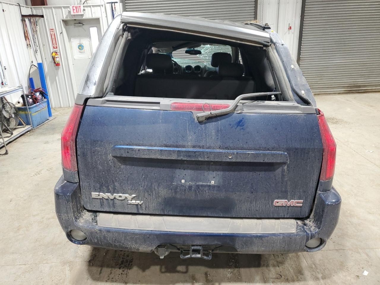 2004 GMC Envoy VIN 1GKET12P946145767 Copart auction photo, rollover damage thumbnail 6