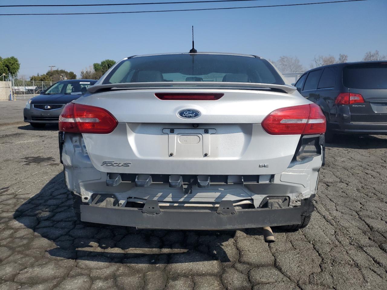 2015 Ford Focus VIN 1FADP3F2XFL326781 Copart auction photo, rear end damage thumbnail 6