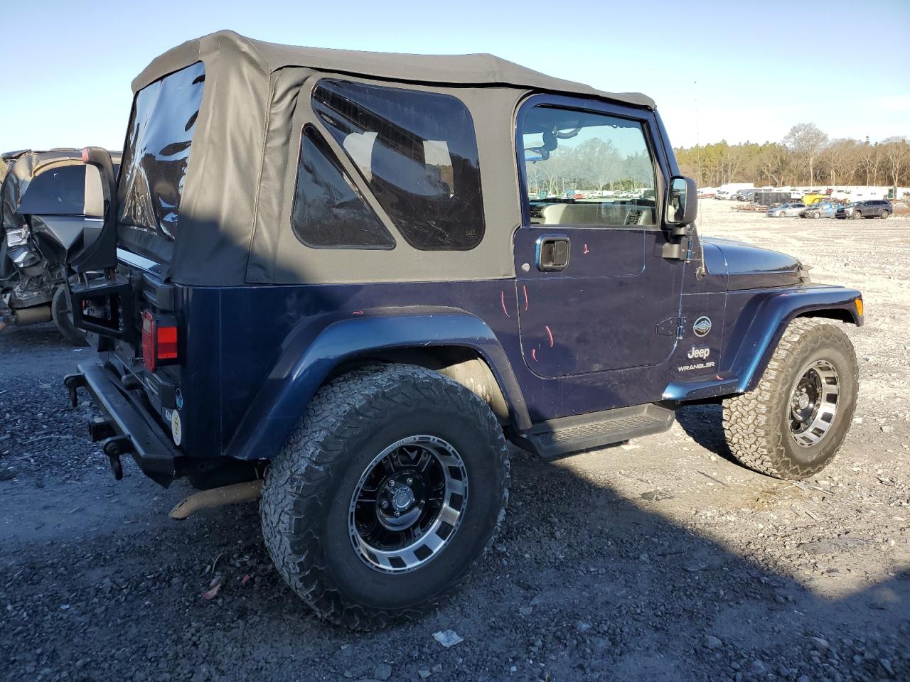 2005 Jeep Wrangler VIN 1J4FA39SX5P370040 Copart auction photo, rear end / minor dent/scratches damage thumbnail 3