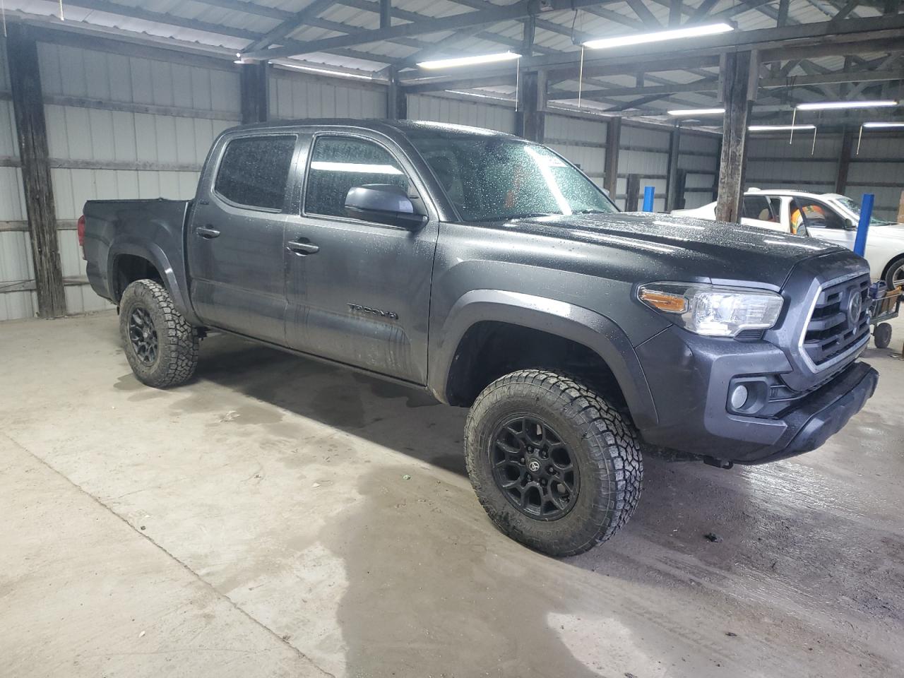 2019 Toyota Tacoma VIN 3TMCZ5AN5KM214377 Copart auction photo, rear end / frame damage damage thumbnail 4