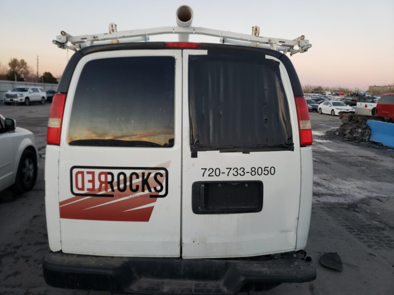 2009 Chevrolet Express VIN 1GCFG15X691143561 Copart auction photo, front end / hail damage thumbnail 6