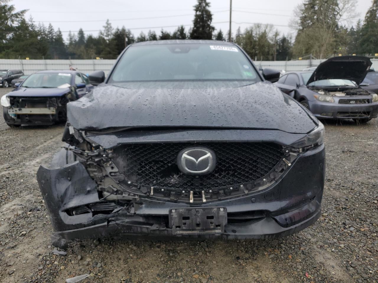 2019 Mazda CX-5 VIN JM3KFBEY8K0584126 Copart auction photo, front end / side damage thumbnail 5