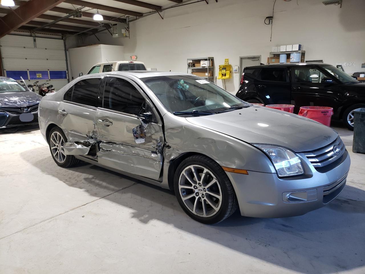 2008 Ford Fusion VIN 3FAHP08128R162189 Copart auction photo, side damage thumbnail 4