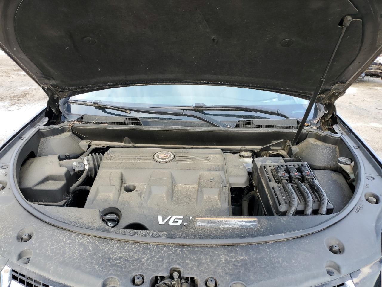2016 Cadillac SRX VIN 3GYFNBE36GS556109 Copart auction photo, vandalism damage thumbnail 12