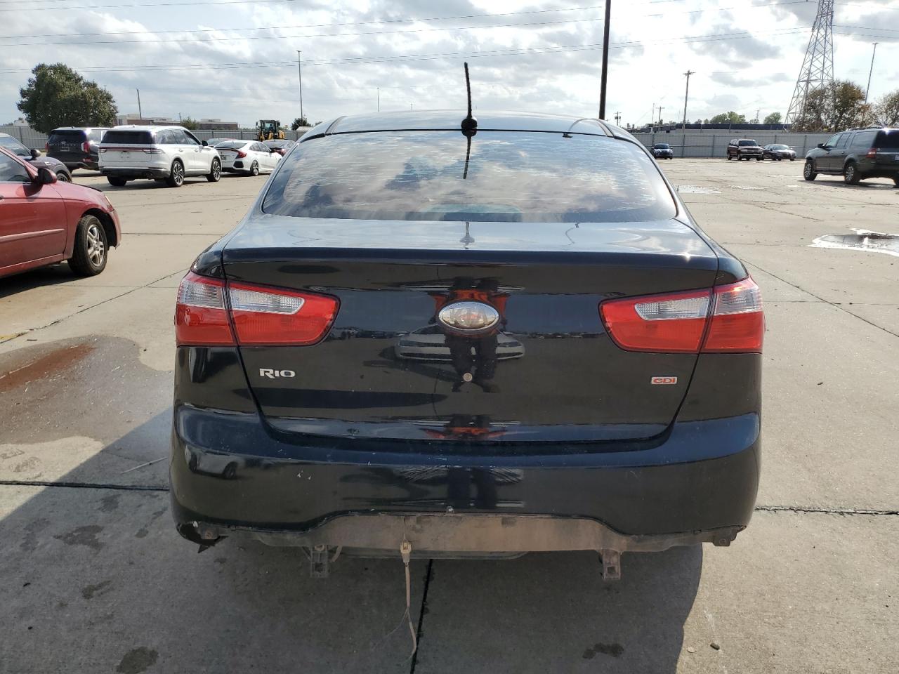2013 KIA Rio VIN KNADM4A32D6200545 Copart auction photo, all over damage thumbnail 6