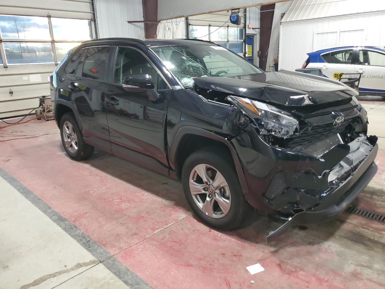 2023 Toyota RAV 4 VIN 2T3P1RFV8PC360627 Copart auction photo, front end damage thumbnail 4
