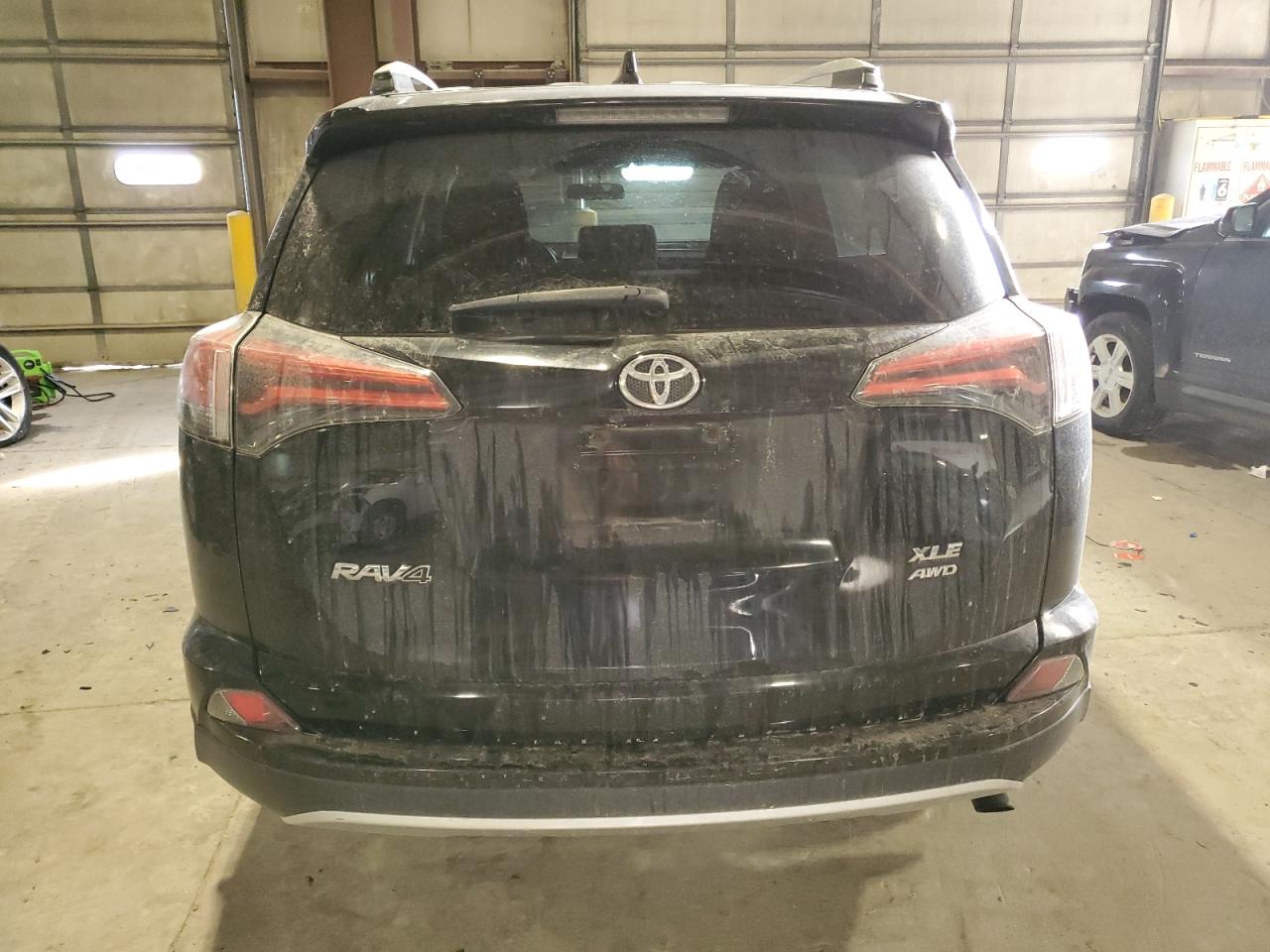 2016 Toyota RAV 4 VIN 2T3RFREV9GW534005 Copart auction photo, front end / minor dent/scratches damage thumbnail 6