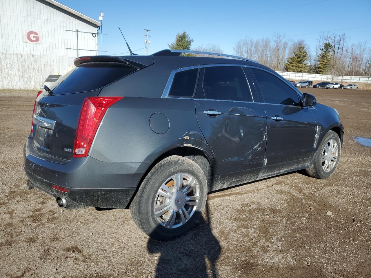 2012 Cadillac SRX VIN 3GYFNDE36CS657799 Copart auction photo, front end / side damage thumbnail 3