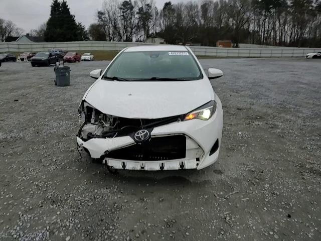 2018 Toyota Corolla VIN 5YFBURHE2JP749505 Copart auction photo, front end damage thumbnail 10