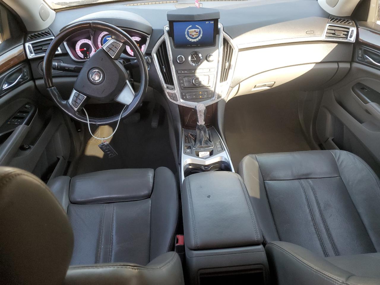 2012 Cadillac SRX VIN 3GYFNBE36CS643194 Copart auction photo, front end / minor dent/scratches damage thumbnail 8