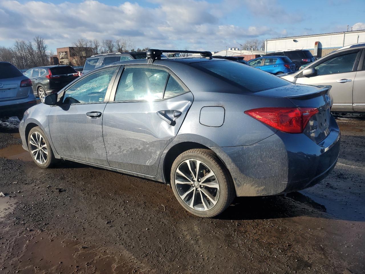 2017 Toyota Corolla VIN 5YFBURHE1HP647591 Copart auction photo, side / top/roof damage thumbnail 2