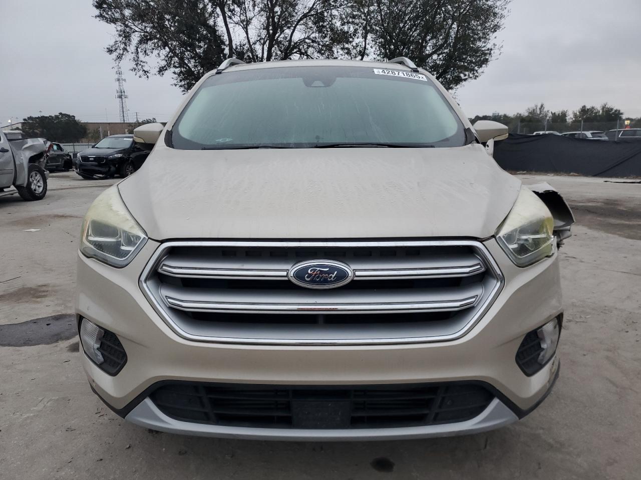 2017 Ford Escape VIN 1FMCU0J90HUD86420 Copart auction photo, front end / side damage thumbnail 5