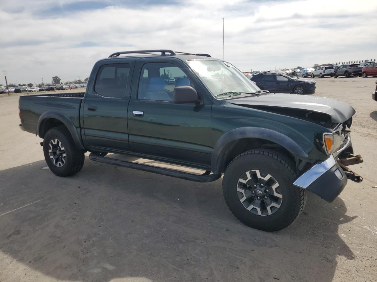2002 Toyota Tacoma VIN 5TEGN92N52Z888695 Copart auction photo, front end / side damage thumbnail 4