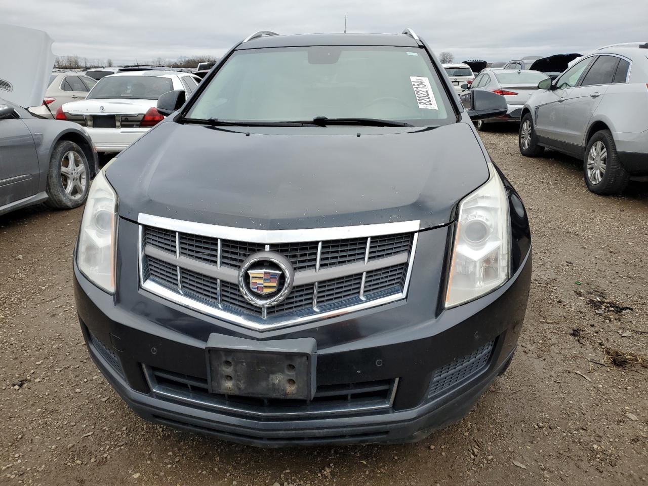 2012 Cadillac SRX VIN 3GYFNDE34CS561640 Copart auction photo, minor dent/scratches damage thumbnail 5