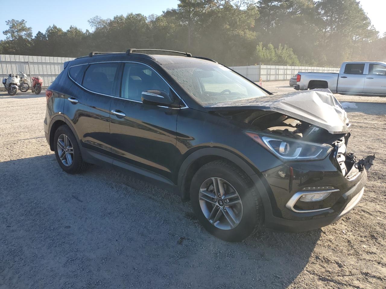 2018 Hyundai Santa Fe VIN 5XYZU3LB8JG554909 Copart auction photo, front end damage thumbnail 4