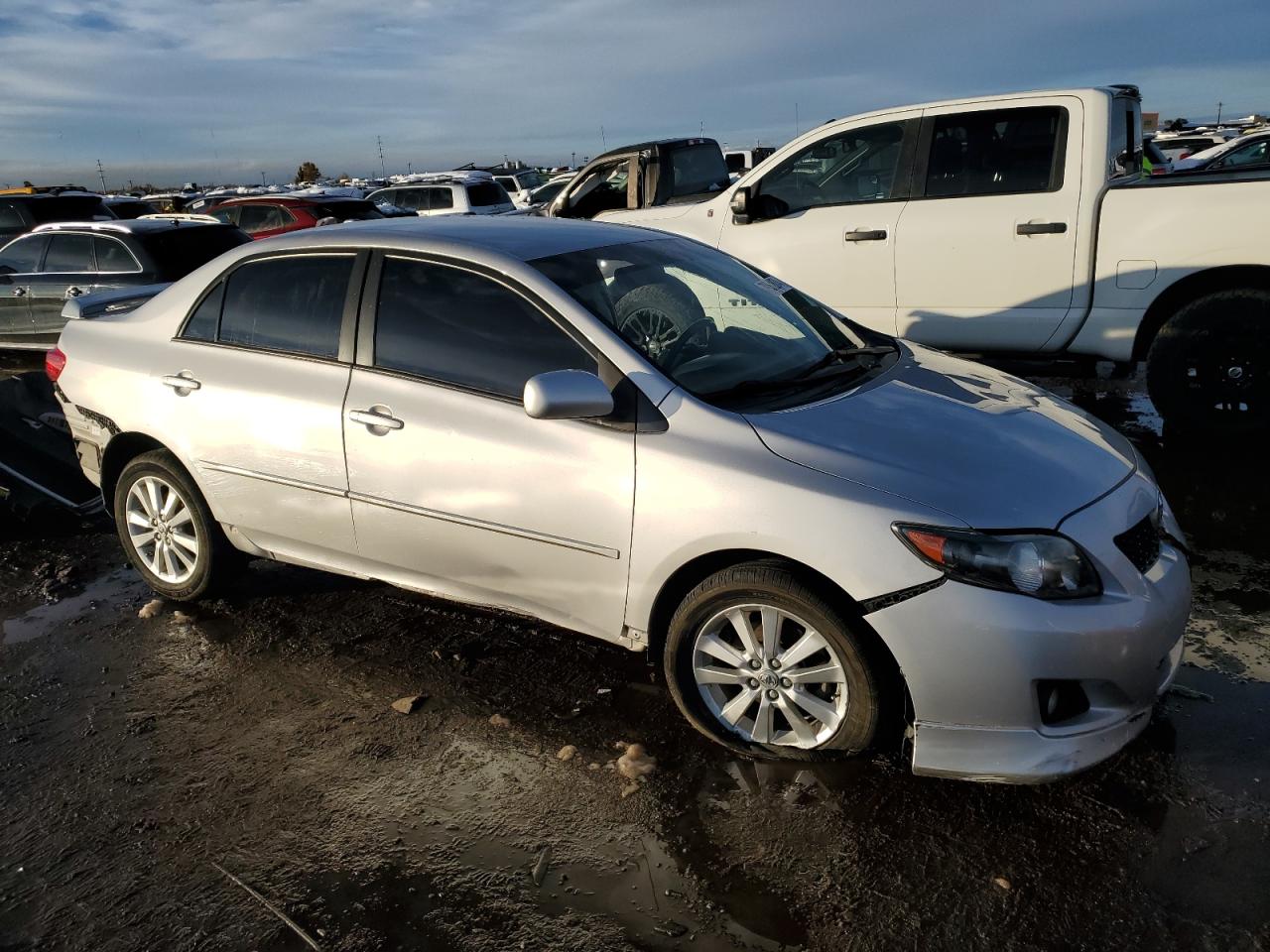 2010 Toyota Corolla VIN 2T1BU4EE1AC421189 Copart auction photo, all over damage thumbnail 4