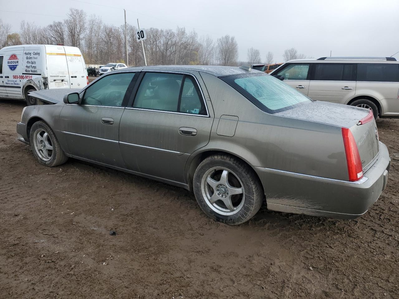 2011 Cadillac DTS VIN 1G6KH5E64BU105909 Copart auction photo, front end / side damage thumbnail 2