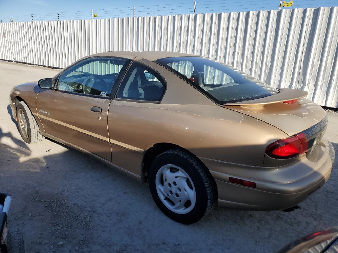 1999 Pontiac Sunfire VIN 1G2JB1245X7529115 Copart auction photo, minor dent/scratches damage thumbnail 2