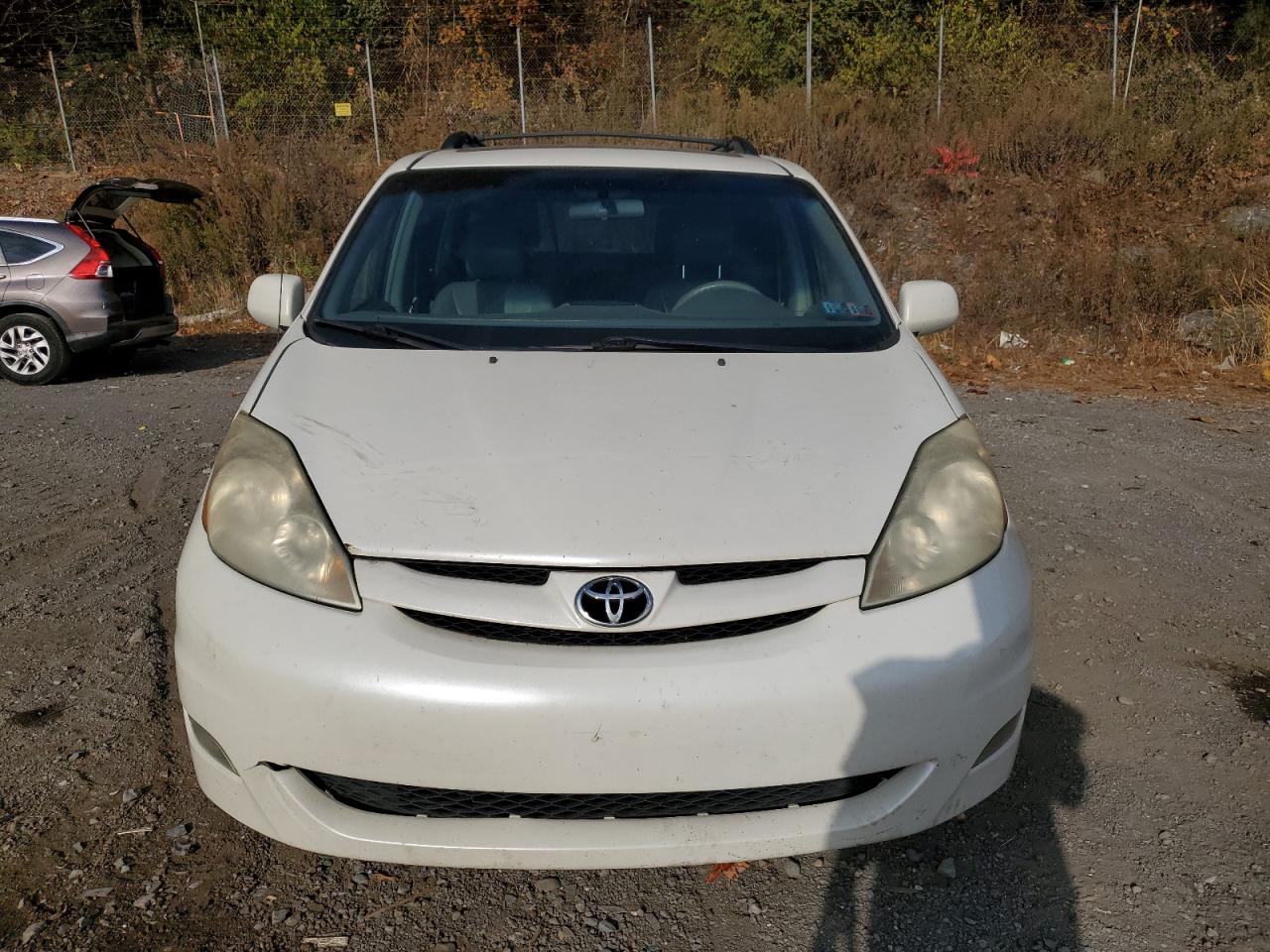 2010 Toyota Sienna VIN 5TDYK4CC4AS300794 Copart auction photo, side / minor dent/scratches damage thumbnail 5