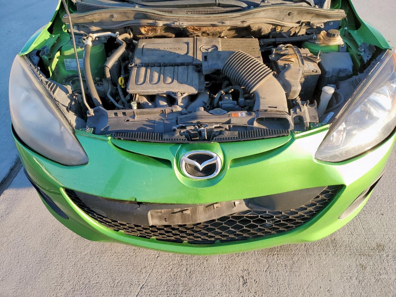 2012 Mazda 2 VIN JM1DE1KYXC0142436 Copart auction photo, front end / minor dent/scratches damage thumbnail 11