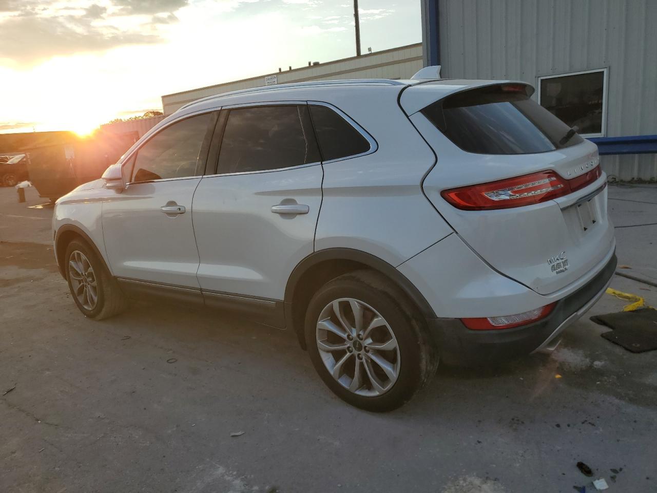 2019 Lincoln MKC VIN 5LMCJ2C9XKUL50191 Copart auction photo, side / rear end damage thumbnail 2