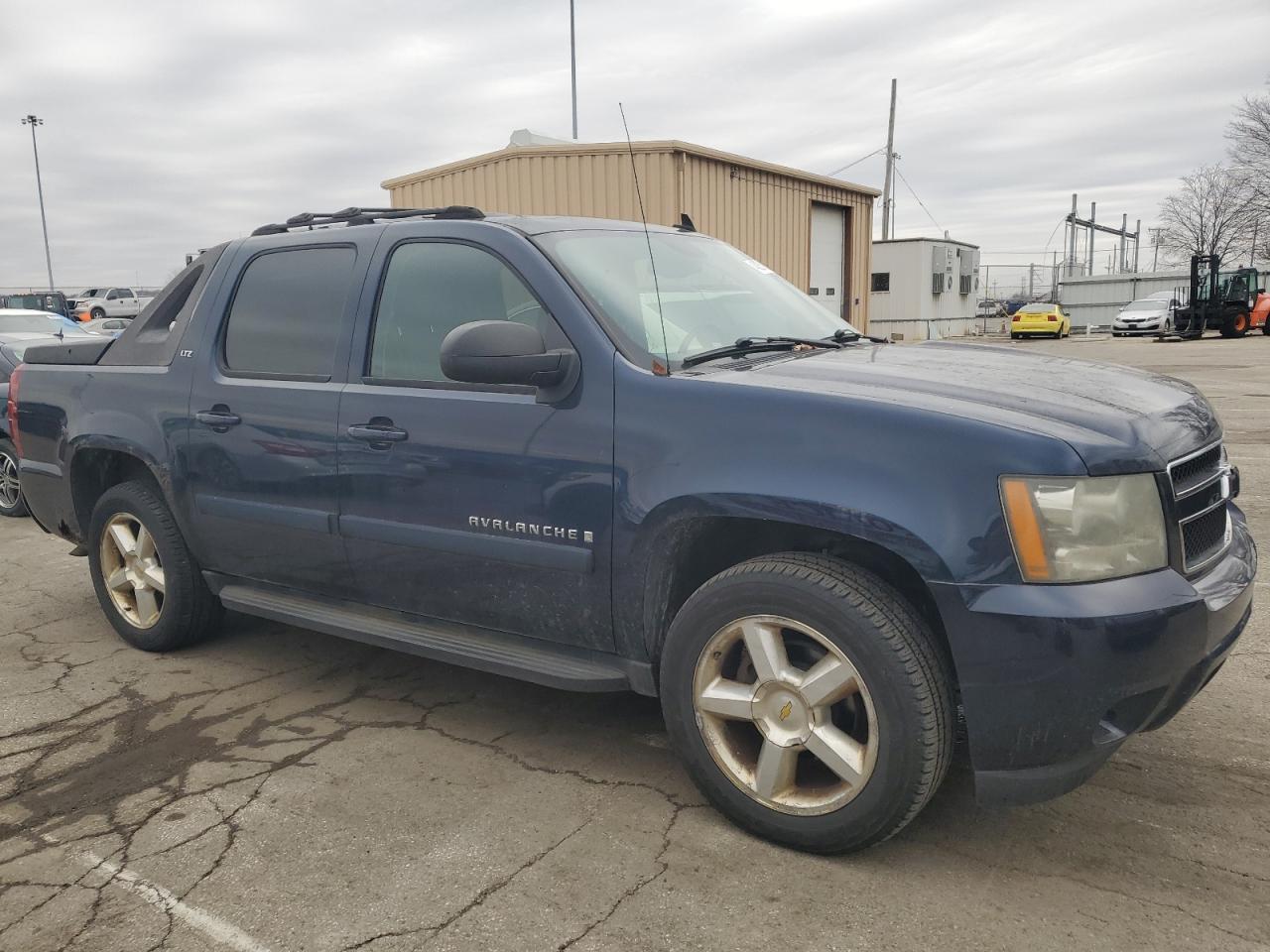 2007 Chevrolet Avalanche VIN 3GNFK12327G233781 Copart auction photo, rear end damage thumbnail 4