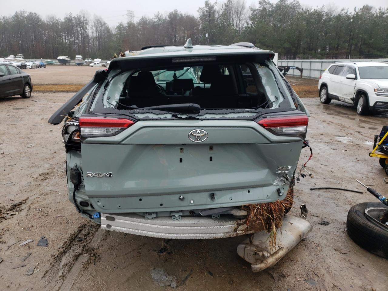 2019 Toyota RAV 4 VIN JTMP1RFV7KD500106 Copart auction photo, all over / undercarriage damage thumbnail 6