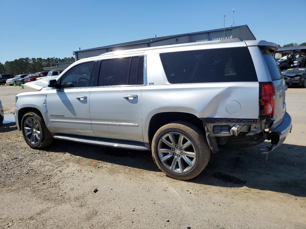 2015 Chevrolet Suburban VIN 1GNSCKKC0FR158448 Copart auction photo, front end / rear end damage thumbnail 2