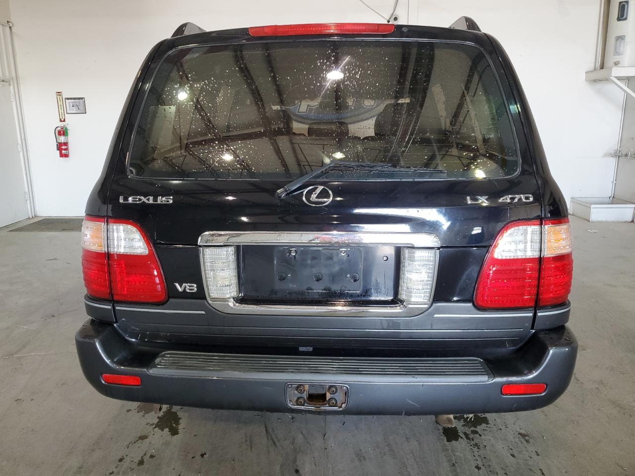 2003 Lexus LX VIN JTJHT00W533531886 Copart auction photo, minor dent/scratches damage thumbnail 6