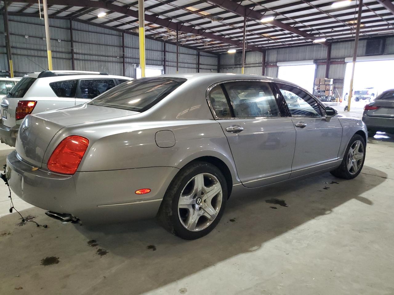 2006 Bentley Continental VIN SCBBR53W06C034462 Copart auction photo, side / rear end damage thumbnail 3