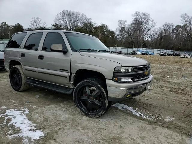 2001 Chevrolet Tahoe VIN 1GNEC13TX1R102144 Copart auction photo, mechanical / side damage thumbnail 12