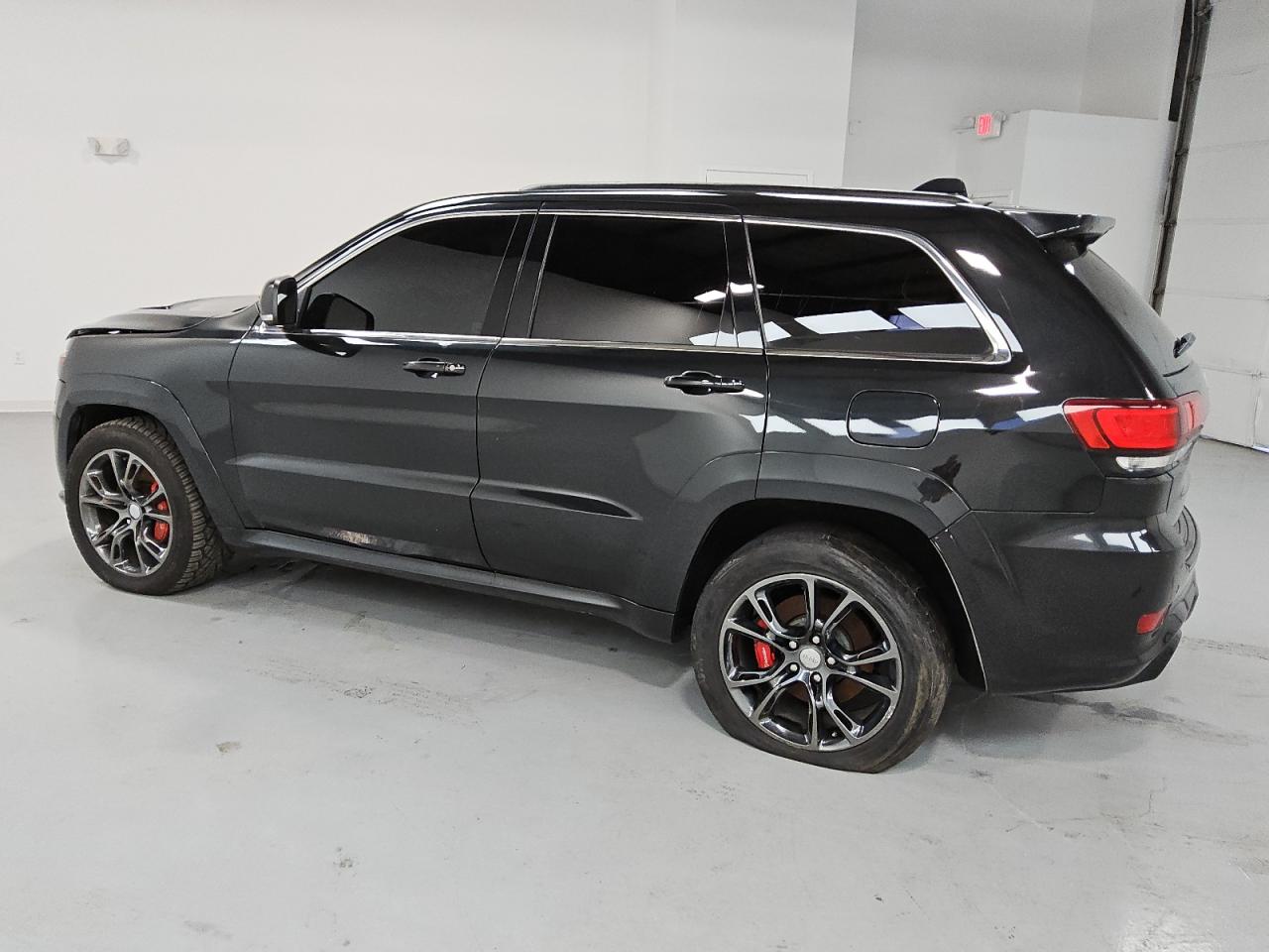 2014 Jeep Grand Cherokee VIN 1C4RJFDJ3EC207482 Copart auction photo, mechanical / normal wear damage thumbnail 2