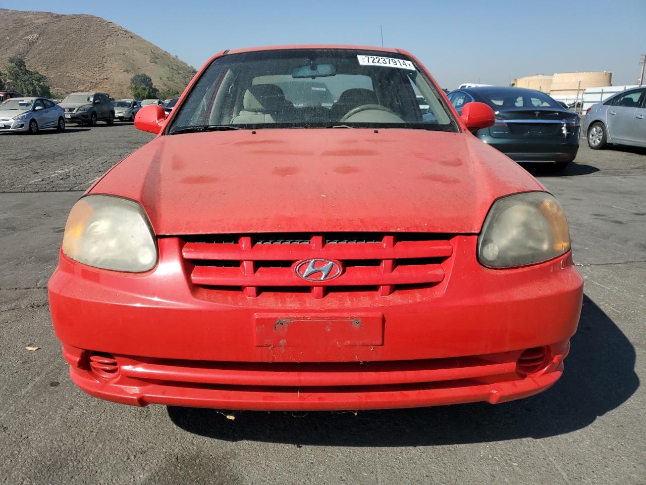2005 Hyundai Accent VIN KMHCG45C55U593854 Copart auction photo, minor dent/scratches damage thumbnail 5