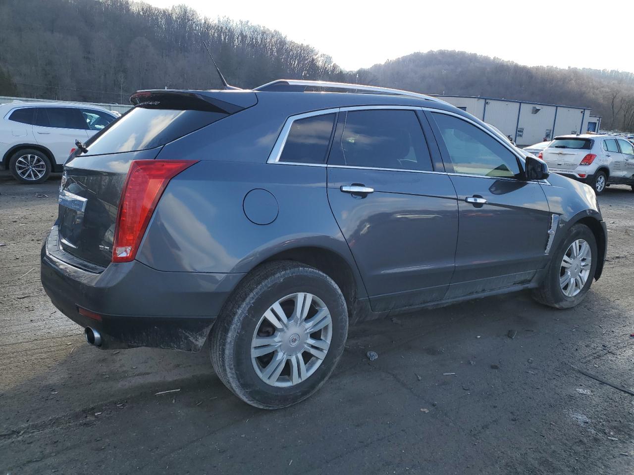 2012 Cadillac SRX VIN 3GYFNDE31CS576337 Copart auction photo, front end / side damage thumbnail 3