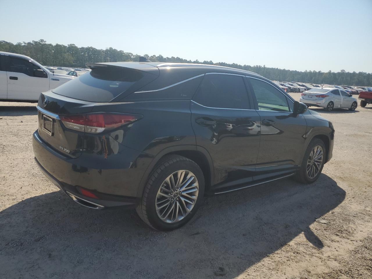 2021 Lexus RX VIN 2T2JZMAA2MC194451 Copart auction photo, side / front end damage thumbnail 3