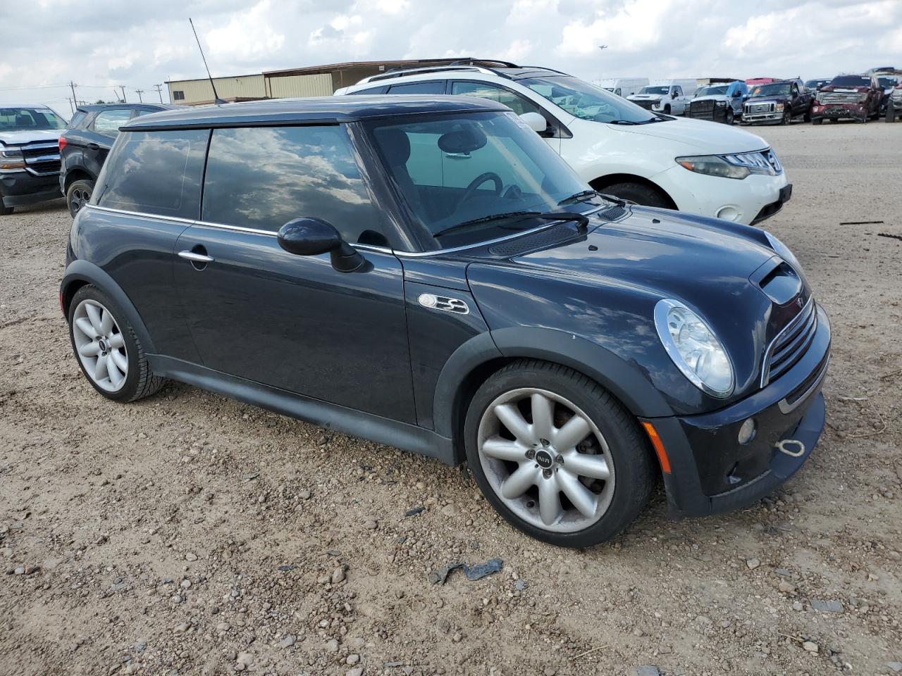 2006 MINI Cooper VIN WMWRE335X6TJ36609 Copart auction photo, side / minor dent/scratches damage thumbnail 4
