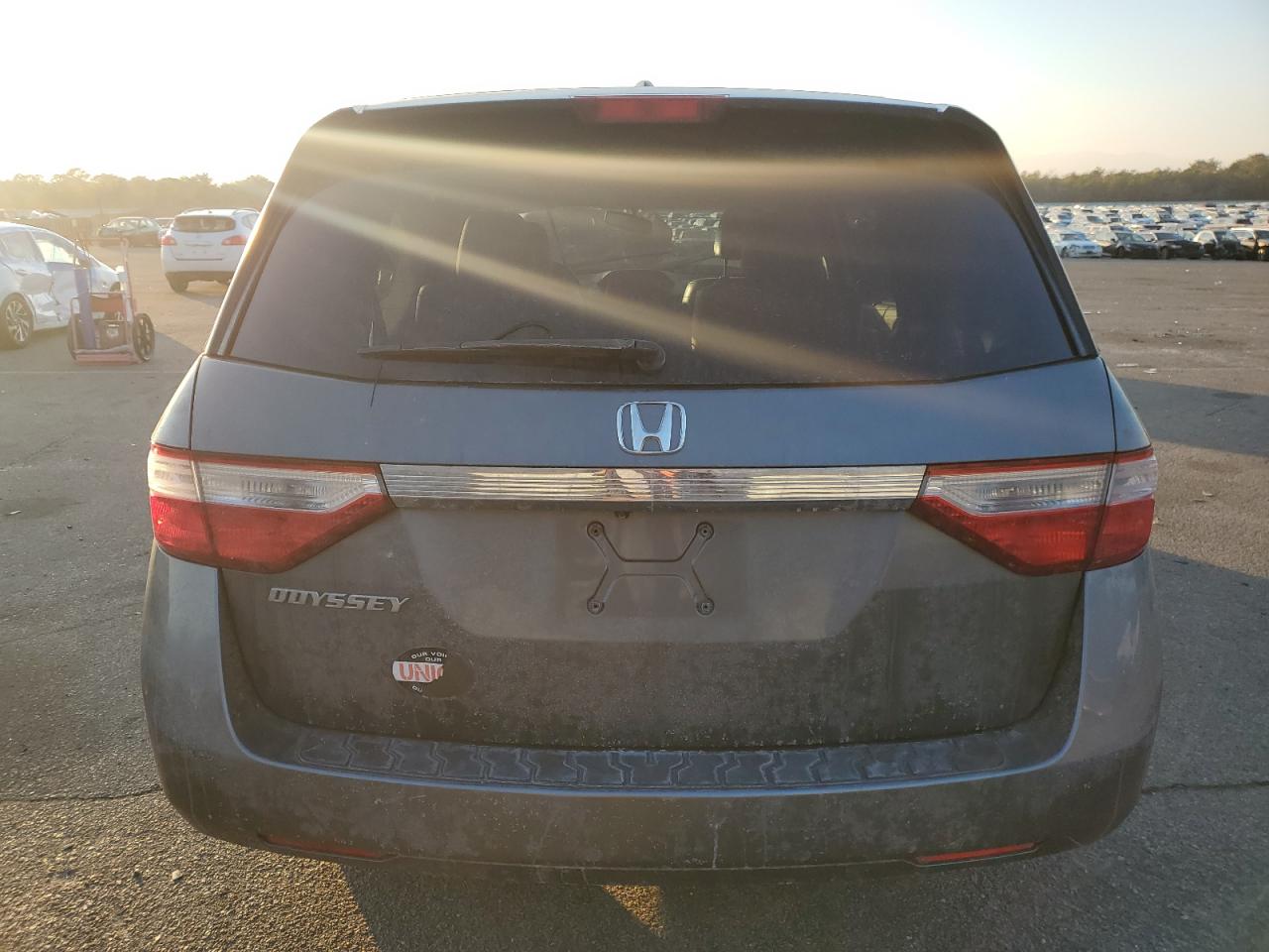 2012 Honda Odyssey VIN 5FNRL5H69CB076231 Copart auction photo, front end / minor dent/scratches damage thumbnail 6