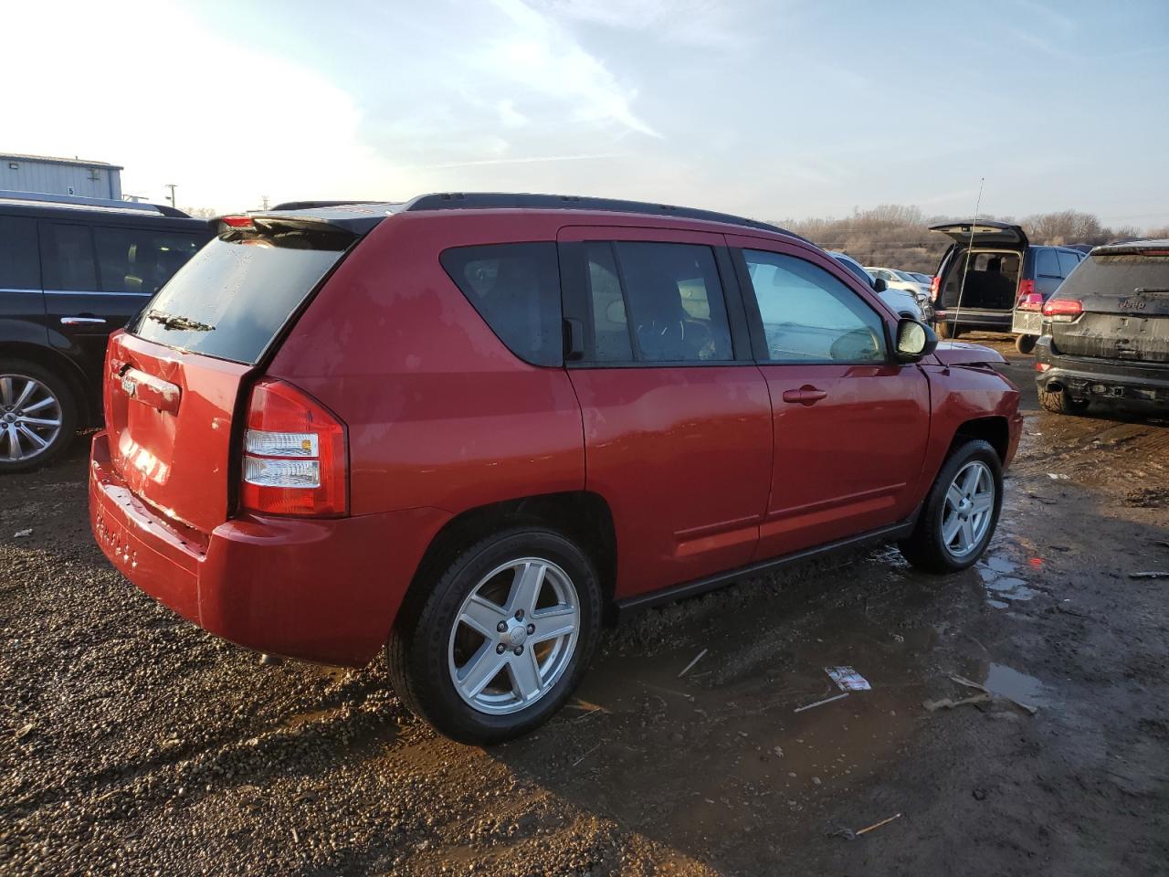 2010 Jeep Compass VIN 1J4NT4FA2AD525666 Copart auction photo, front end damage thumbnail 3