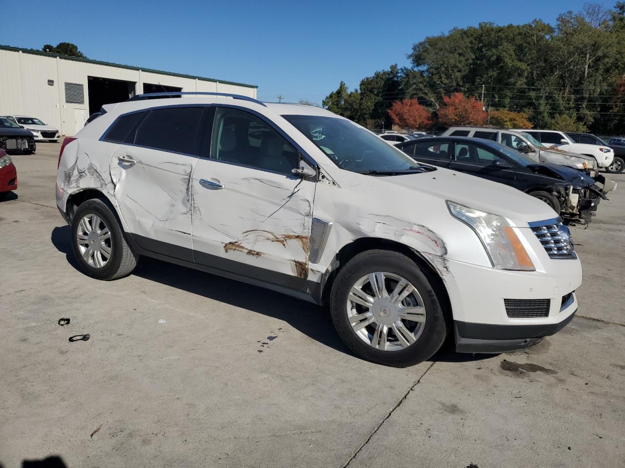 2016 Cadillac SRX VIN 3GYFNBE31GS583881 Copart auction photo, side damage thumbnail 4