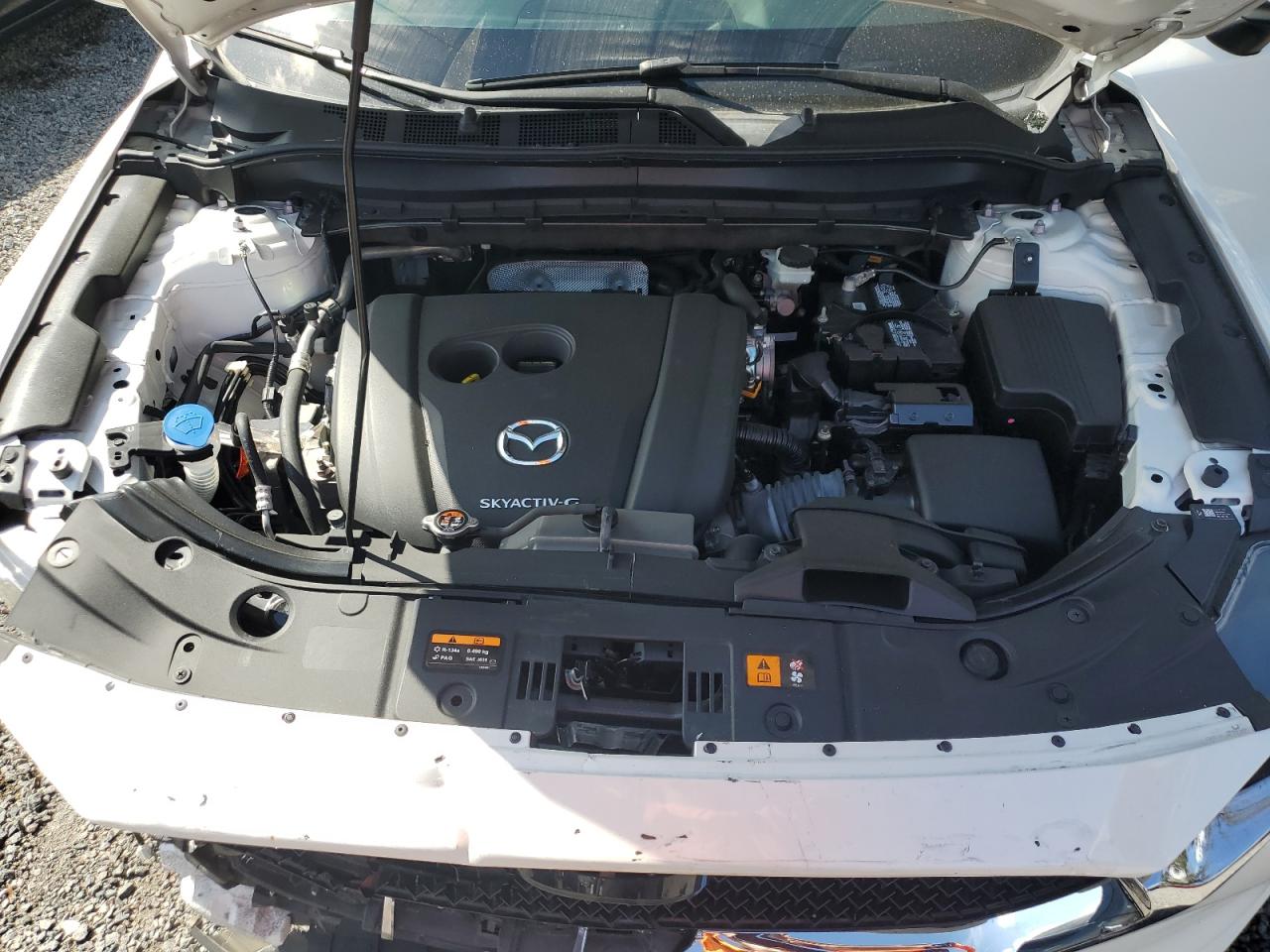 2021 Mazda CX-5 VIN JM3KFBCM3M1494718 Copart auction photo, front end / side damage thumbnail 12