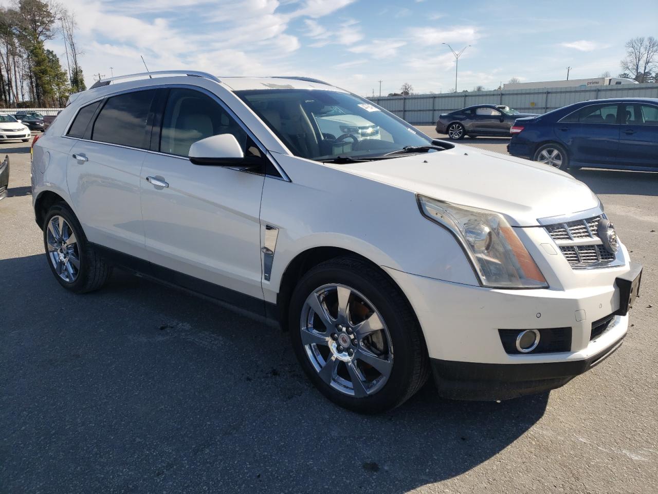 2012 Cadillac SRX VIN 3GYFNBE32CS528110 Copart auction photo, rear end damage thumbnail 4